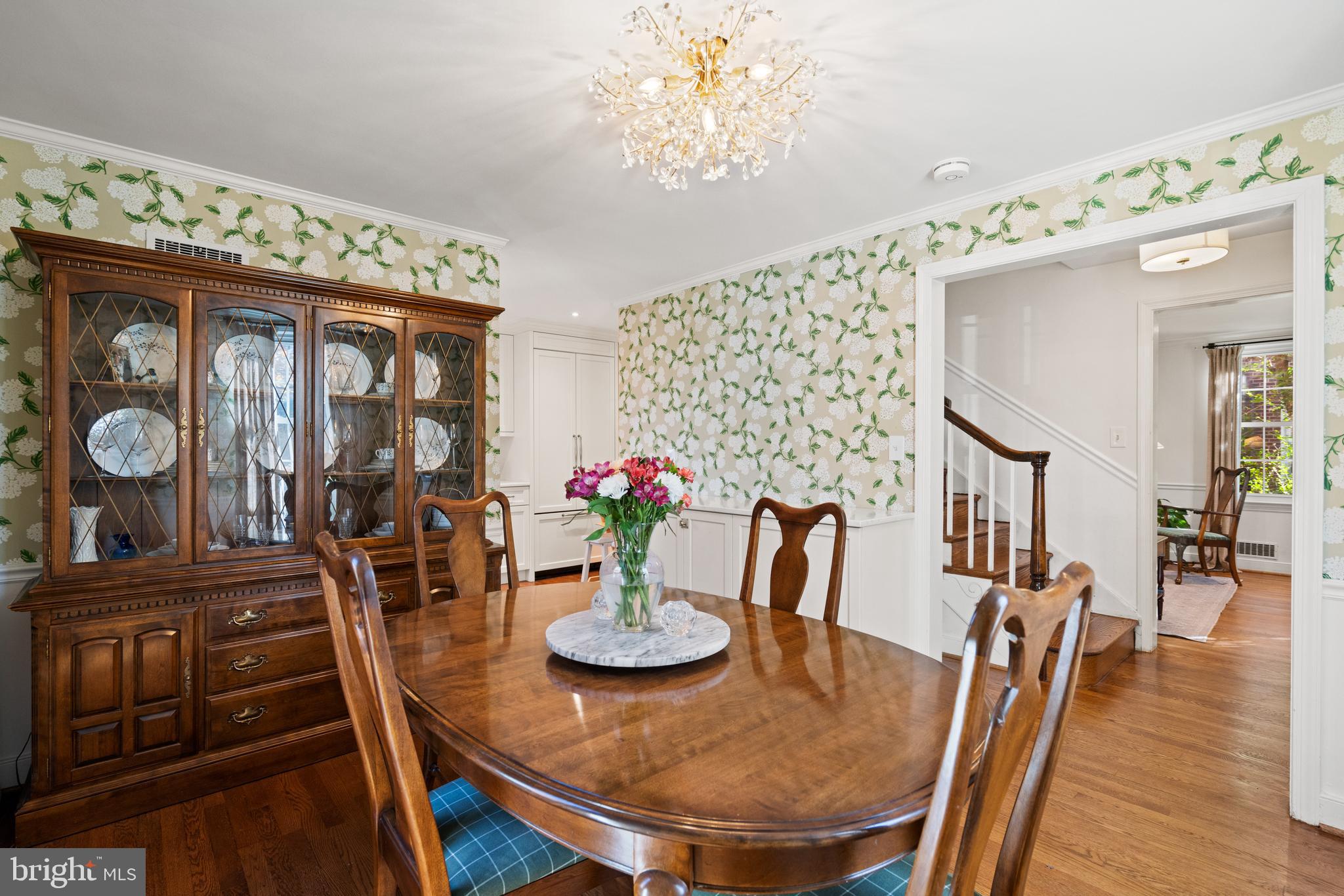 5009 Allan Road Bethesda, MD 20816 - Photo 18 of 65 a view of a dining room with furniture and wooden floor
