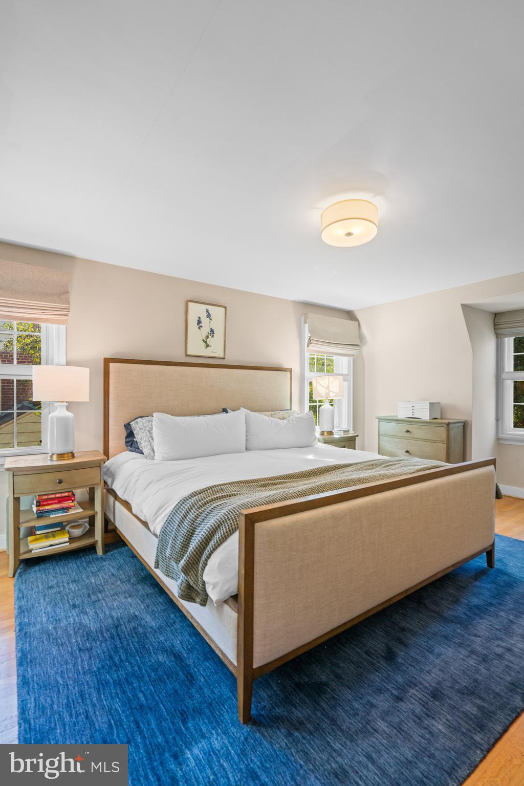 5009 Allan Road Bethesda, MD 20816 - Photo 31 of 65 a bed room with a bed and a night stand