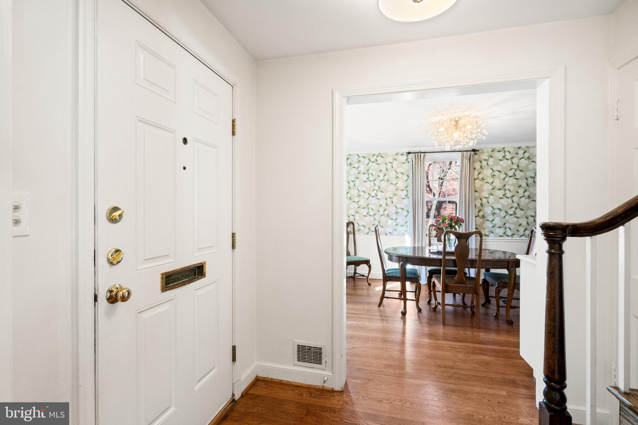 5009 Allan Road Bethesda, MD 20816 - Photo 5 of 65 a view of a dining room with furniture window and wooden floor