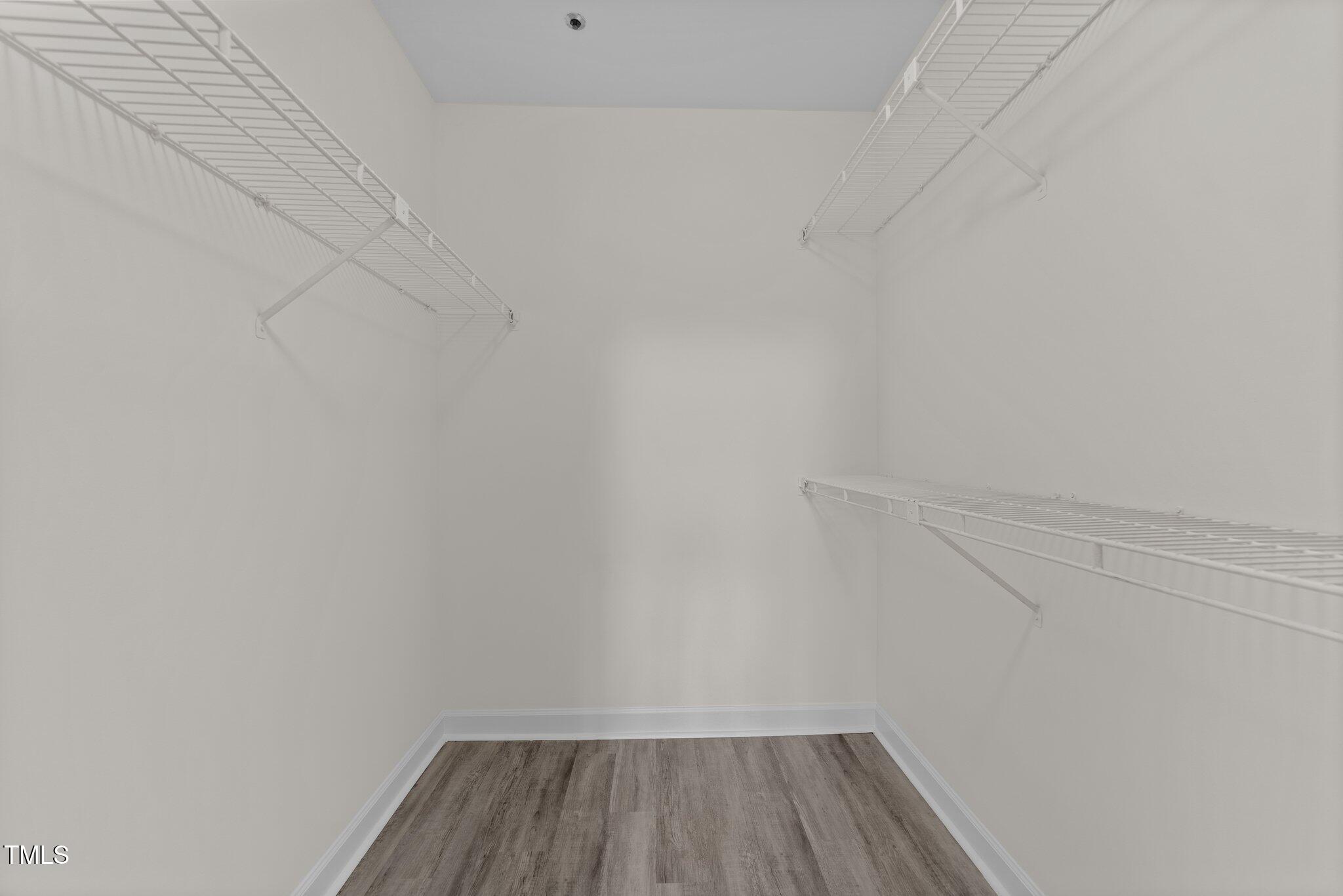 243 New Bern Place, Unit 301 Raleigh, NC 27601 - Photo 19 of 31 a view of small space with racks on the wall