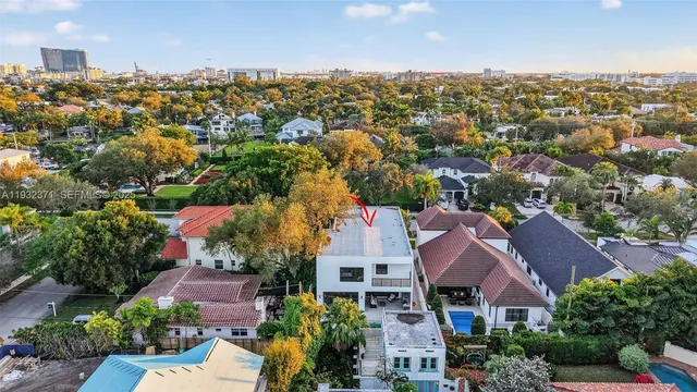an aerial view of house with yard