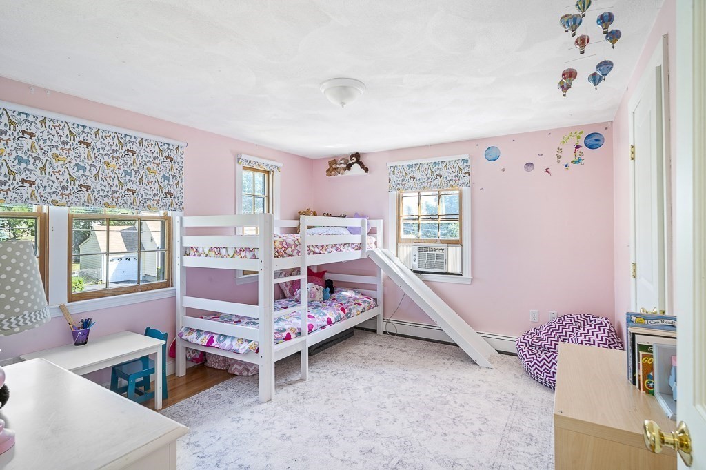 28 Longmeadow Road Arlington, MA 02474 - Photo 16 of 25 a bed room with a bed and a window