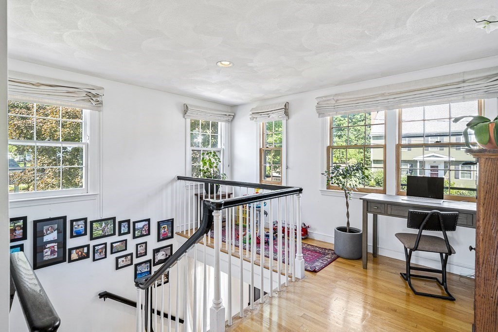 28 Longmeadow Road Arlington, MA 02474 - Photo 19 of 25 a view of a livingroom with furniture window and wooden floor