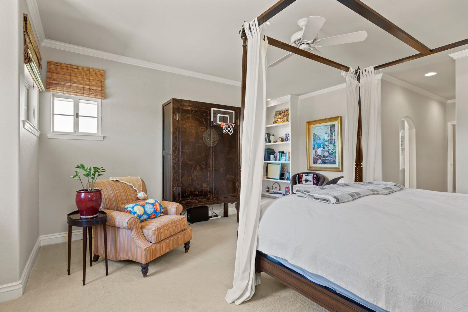 10676 Wilton Road Elk Grove, CA 95624 - Photo 64 of 71 a bed room with a bed and a mirror