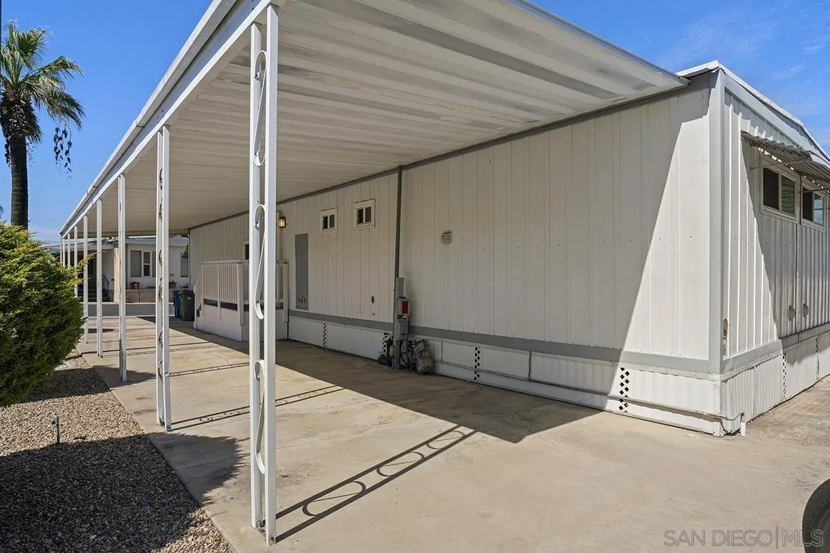 8545 Mission Gorge Road, Unit 239 Santee, CA 92071 - Photo 25 of 26 a spacious bathroom with a tub and mirror