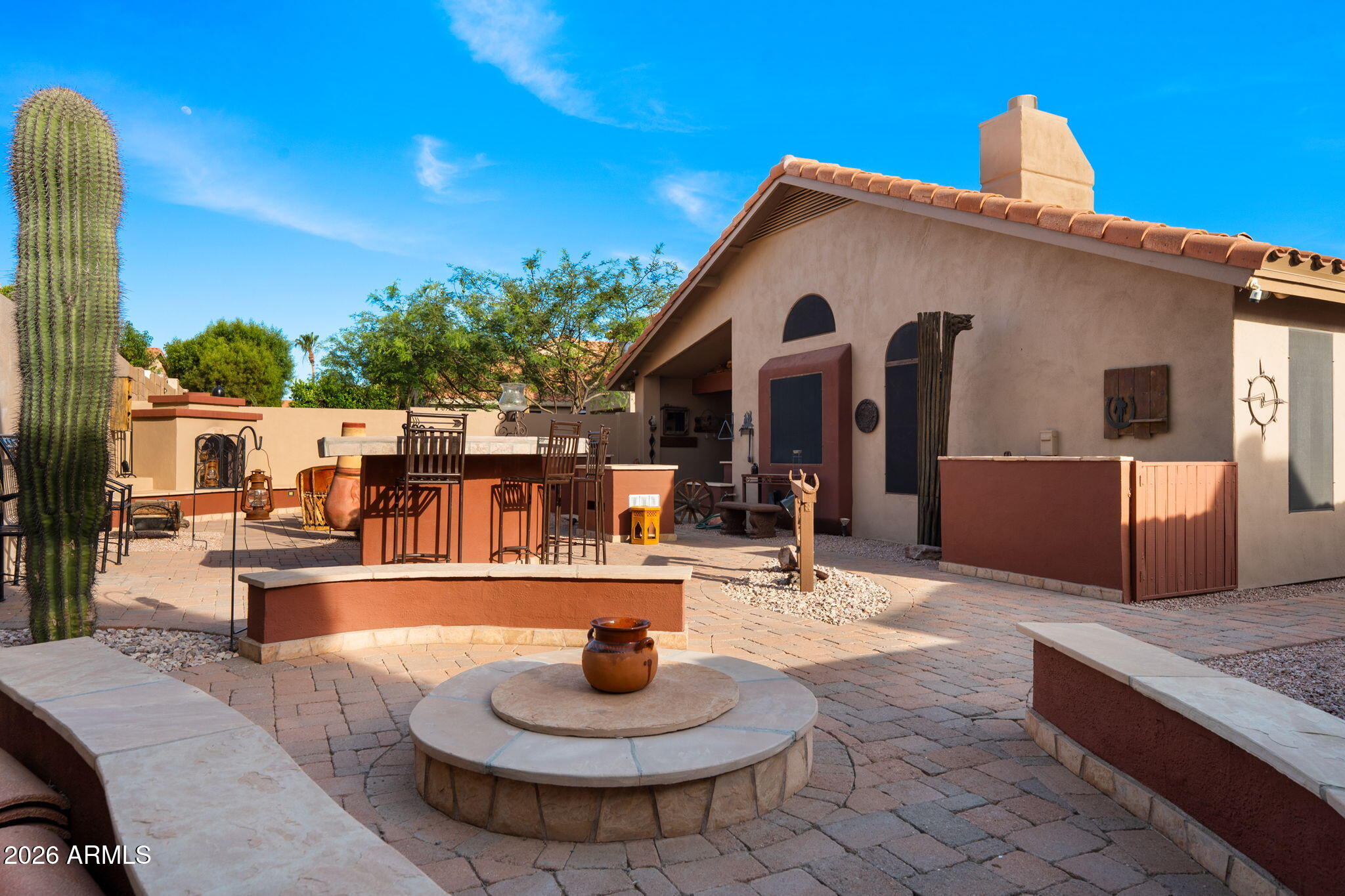 6526 East Raftriver Street Mesa, AZ 85215 - Photo 11 of 17 a outdoor space with the couches and coffee table