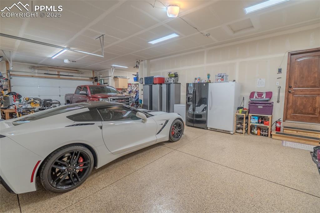 15324 Pole Pine Point Colorado Springs, CO 80908 - Photo 42 of 50 a view of car garage