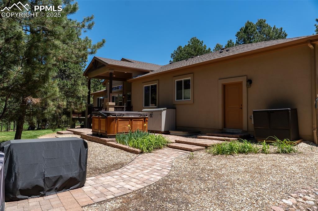 15324 Pole Pine Point Colorado Springs, CO 80908 - Photo 46 of 50 a front view of a house with garden