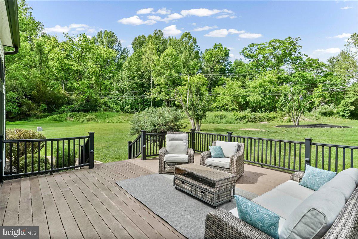 51 Ridings Way Chadds Ford, PA 19317 - Photo 7 of 57 a view of a patio with two chairs and a table