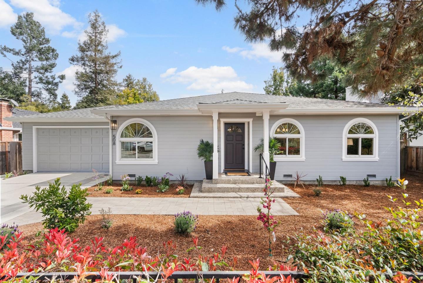 a front view of a house with entertaining space