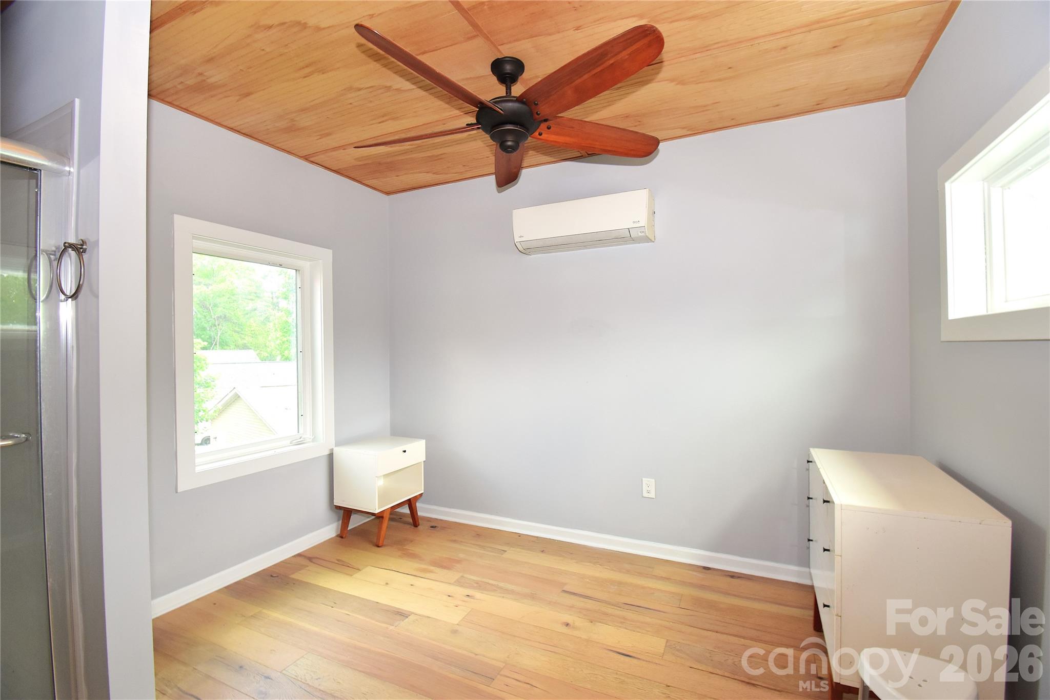 6 Belvedere Road Asheville, NC 28803 - Photo 28 of 33 a bedroom with a bed and a window