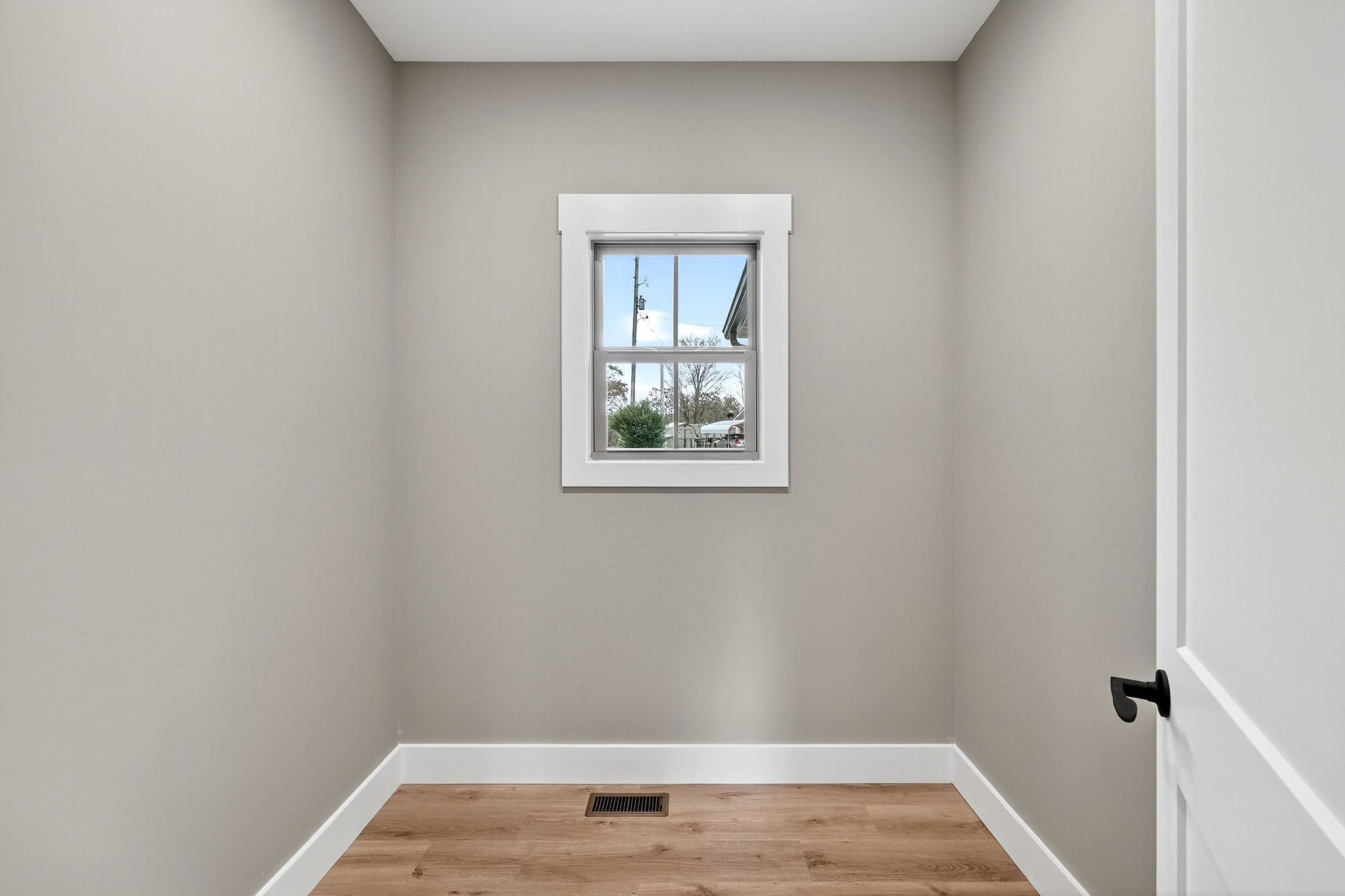 136 East McCormick Road Livingston, TN 38570 - Photo 14 of 29 a view of an empty room with wooden floor and a window