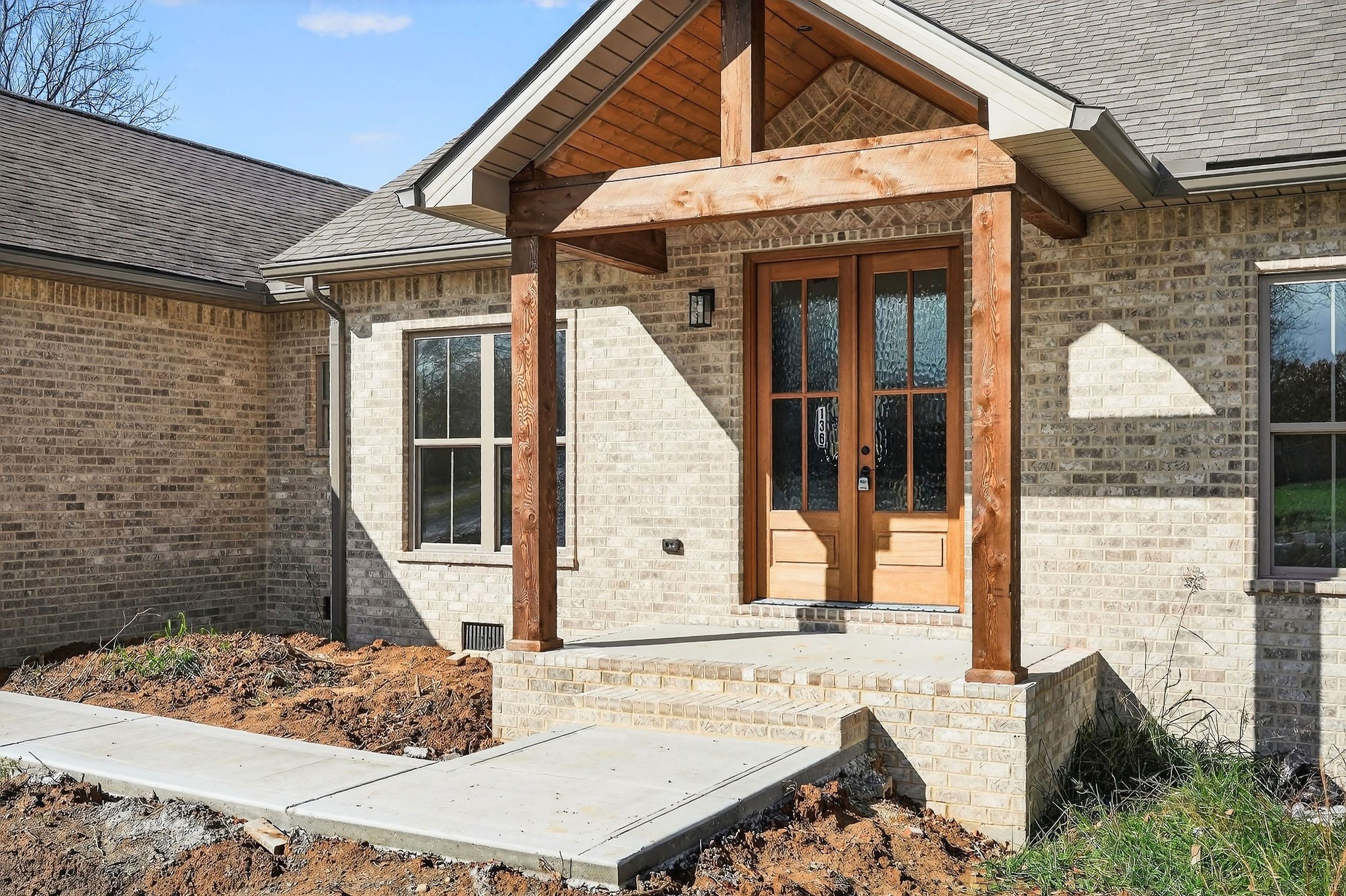 136 East McCormick Road Livingston, TN 38570 - Photo 4 of 29 a view of a brick house with front door