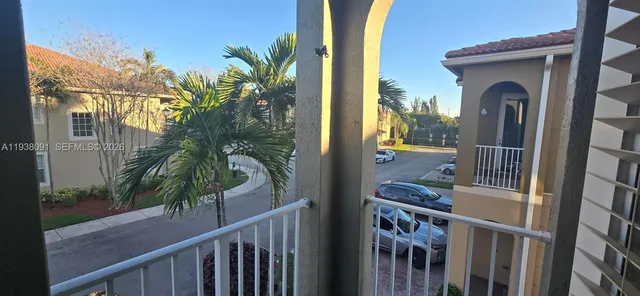 a patio with table and chairs