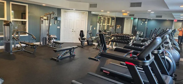 a view of a room with gym equipment