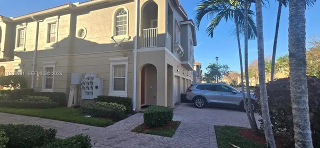 a house view with a garden space