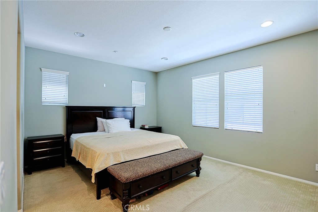 416 Quail Ridge Irvine, CA 92603 - Photo 12 of 23 a bedroom with a bed and a night stand