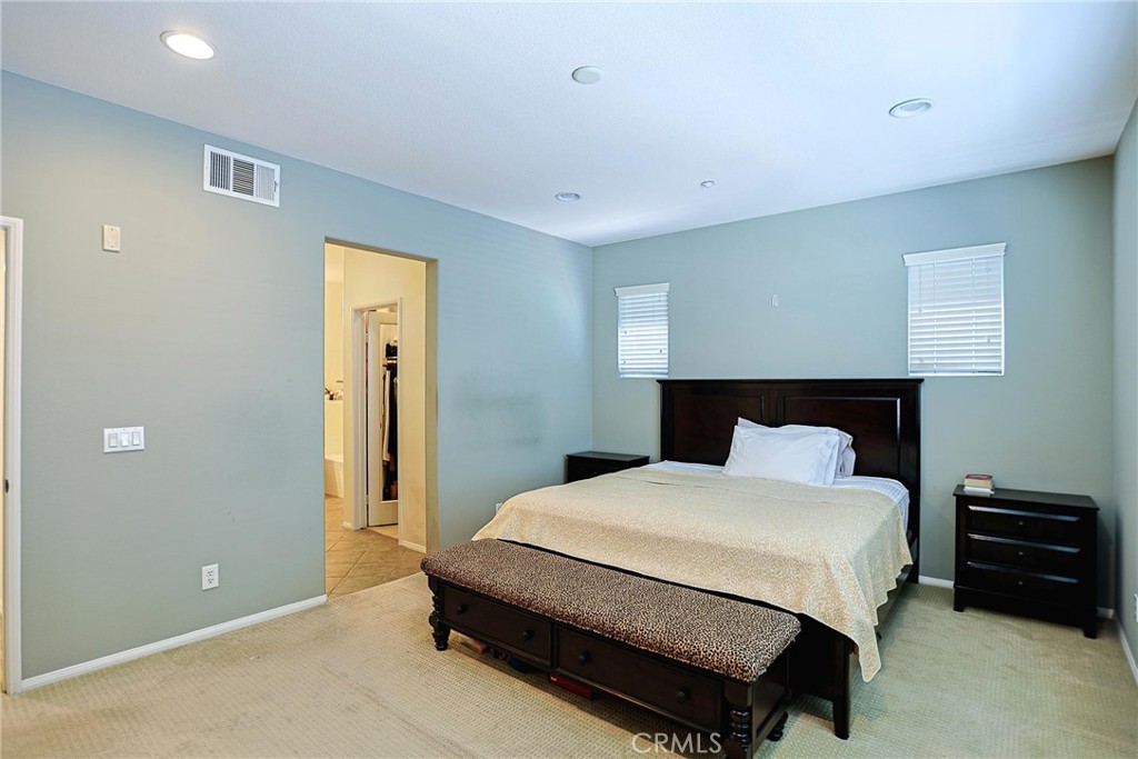 416 Quail Ridge Irvine, CA 92603 - Photo 13 of 23 a bedroom with a bed and a night stand