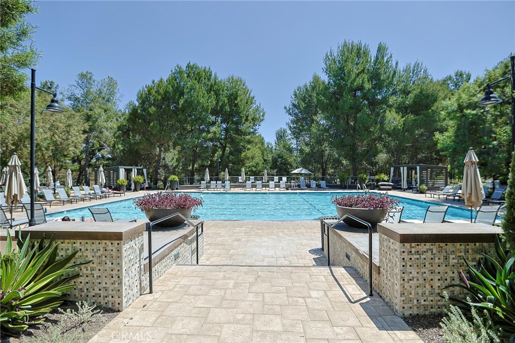 416 Quail Ridge Irvine, CA 92603 - Photo 20 of 23 a view of a chairs and table in the patio