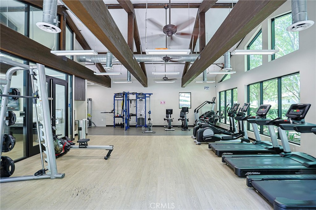 416 Quail Ridge Irvine, CA 92603 - Photo 21 of 23 a view of a room with gym equipment