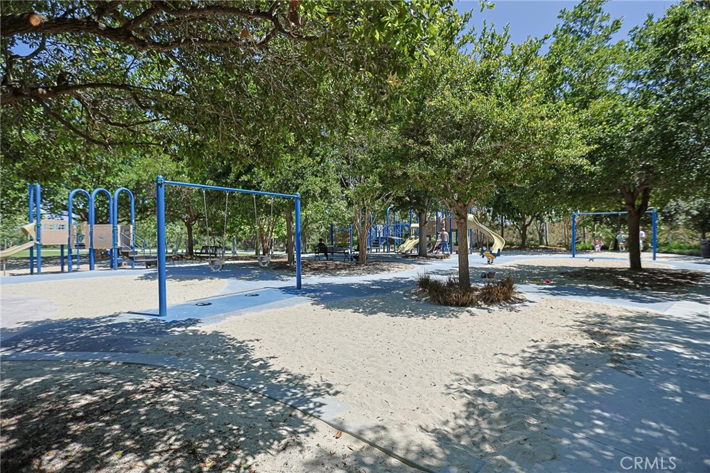 416 Quail Ridge Irvine, CA 92603 - Photo 22 of 23 a view of a park with large trees