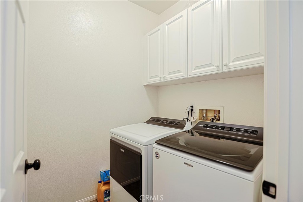 416 Quail Ridge Irvine, CA 92603 - Photo 10 of 23 a utility room with dryer and washer