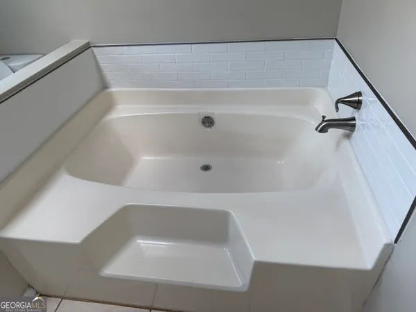 a bathroom with a bathtub