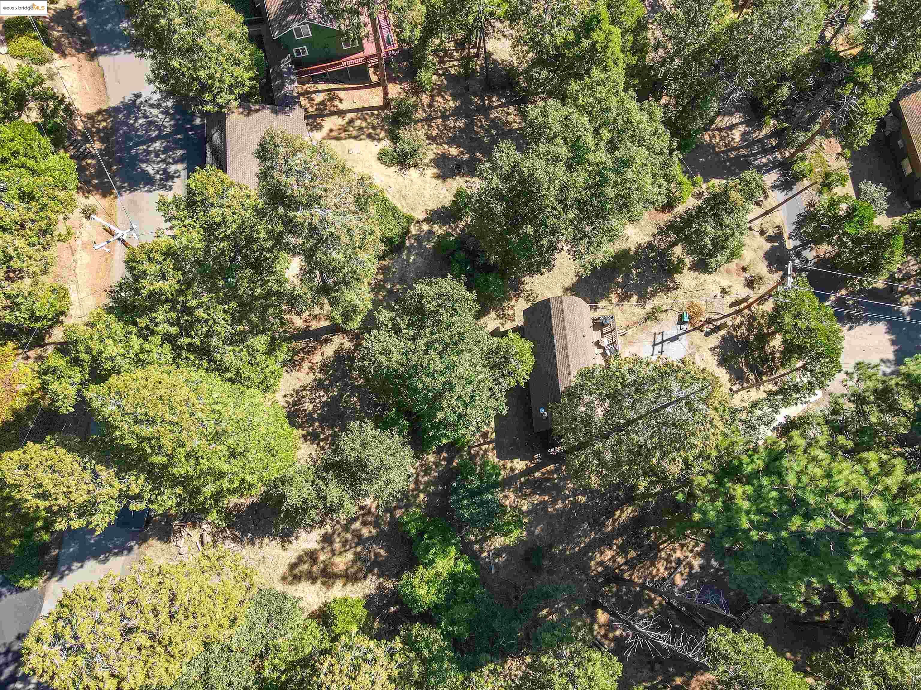 20737 Muheli Road Mi Wuk Village, CA 95346 - Photo 37 of 40 an aerial view of residential house with outdoor space and trees all around