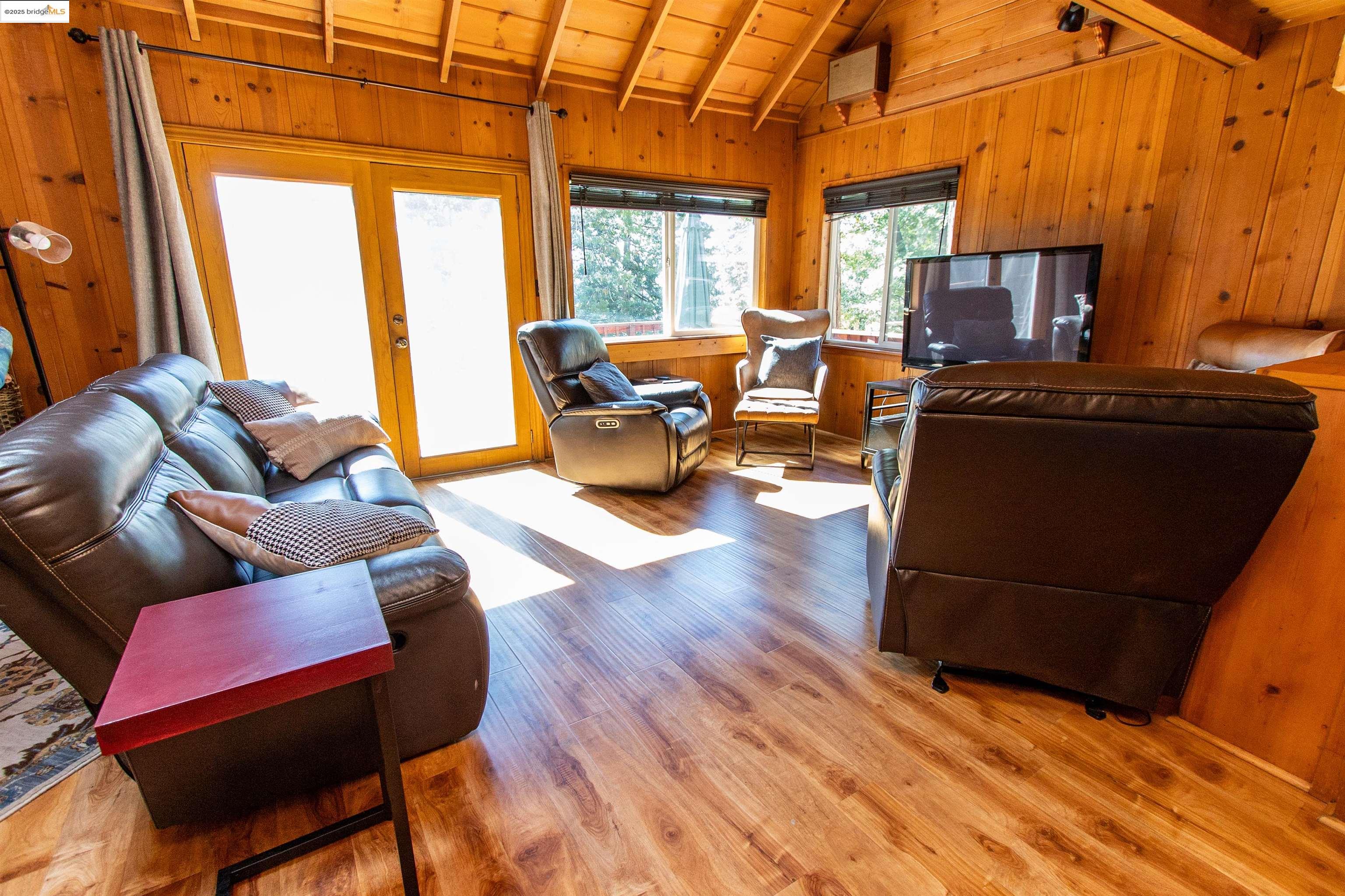 20737 Muheli Road Mi Wuk Village, CA 95346 - Photo 8 of 40 a living room with furniture and a window