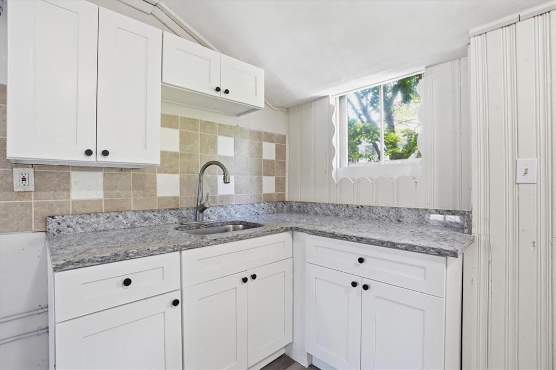 508 Riegel Street Bethlehem, PA 18018 - Photo 6 of 21 a kitchen with granite countertop white cabinets and window