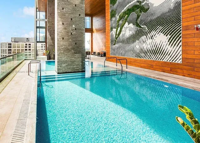 a outdoor dining space with furniture and outdoor view