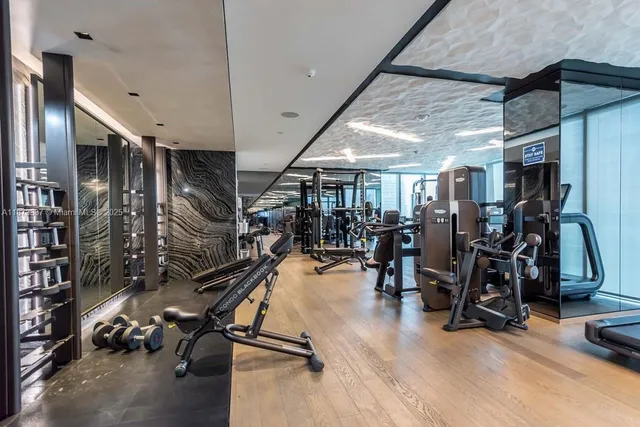 a view of a room with gym equipment