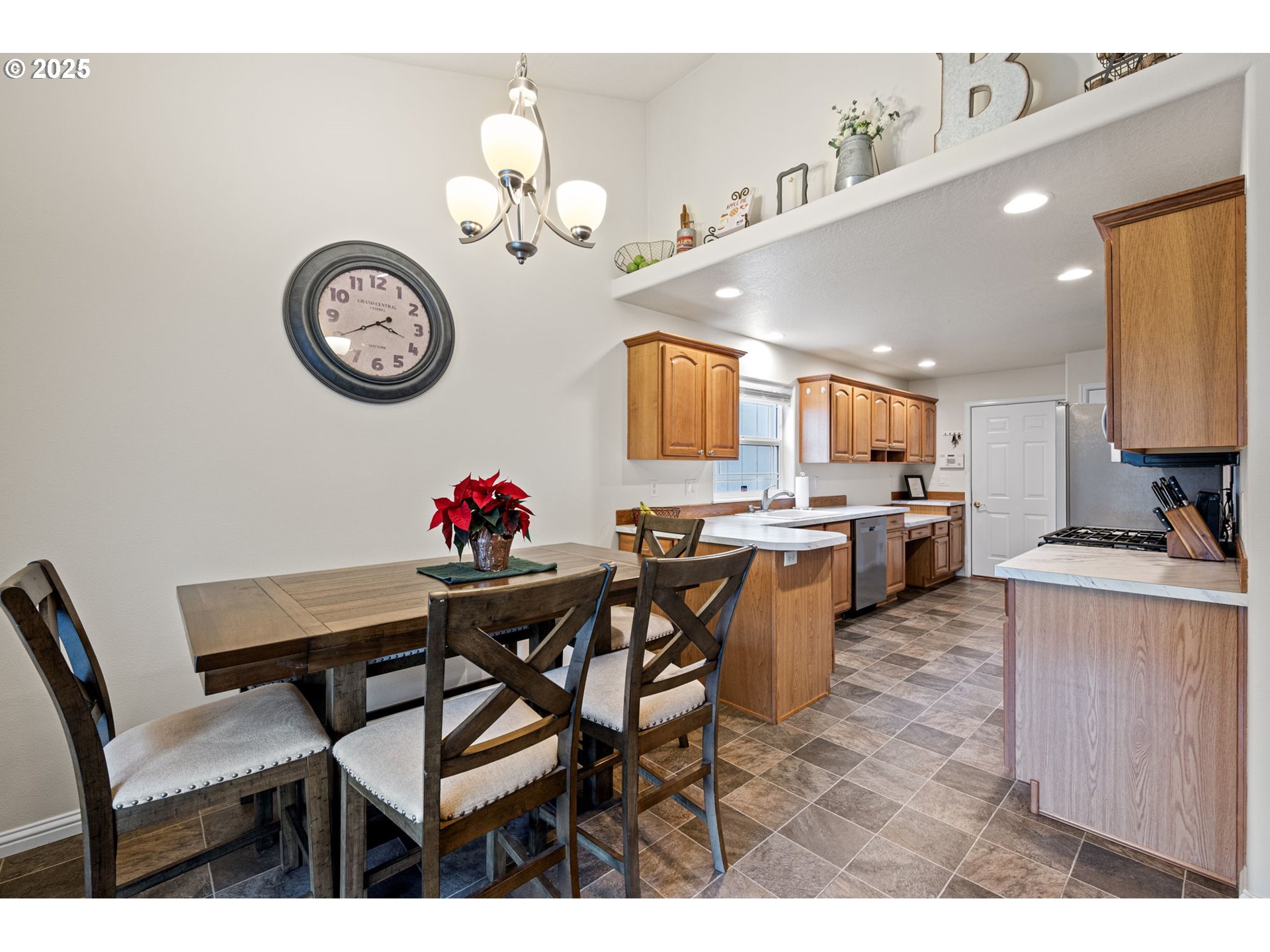 1904 South 6th Street Cottage Grove, OR 97424 - Photo 11 of 37 a view of a dining room with furniture and a chandelier