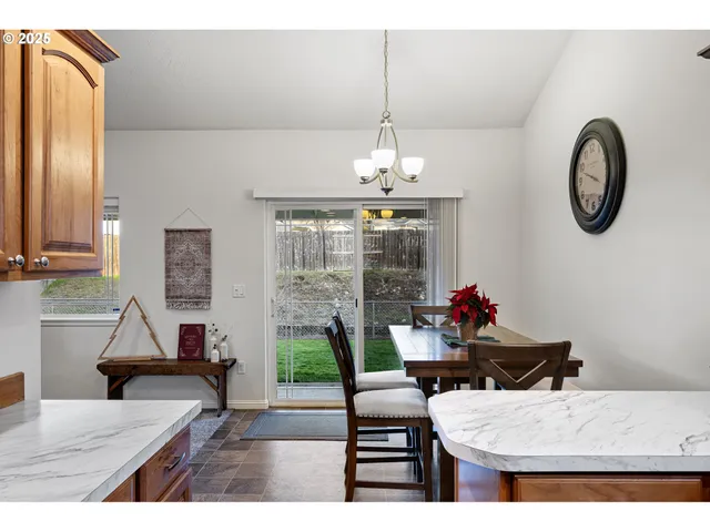 a room with furniture and a chandelier