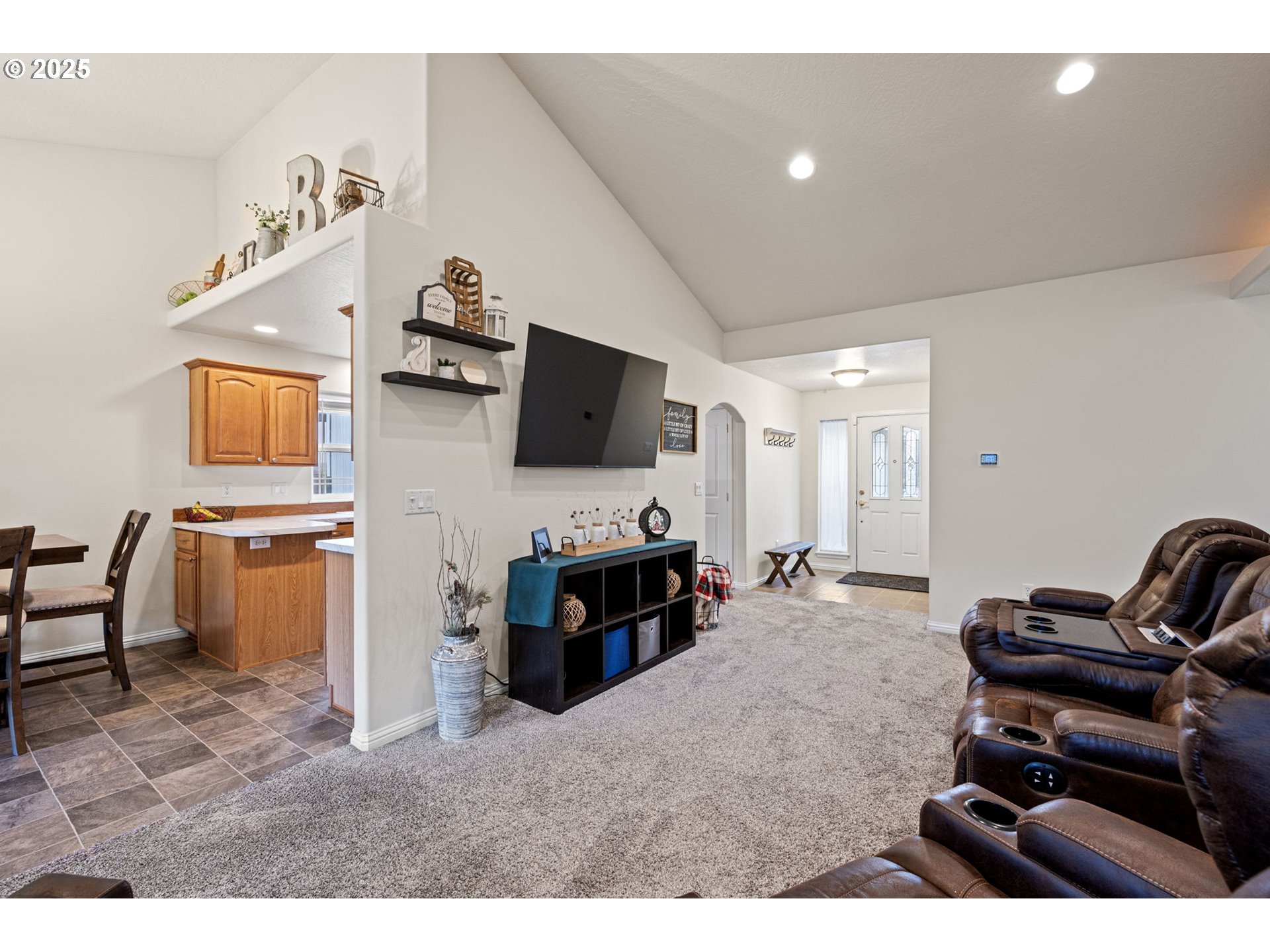 1904 South 6th Street Cottage Grove, OR 97424 - Photo 8 of 37 a living room with furniture and a flat screen tv