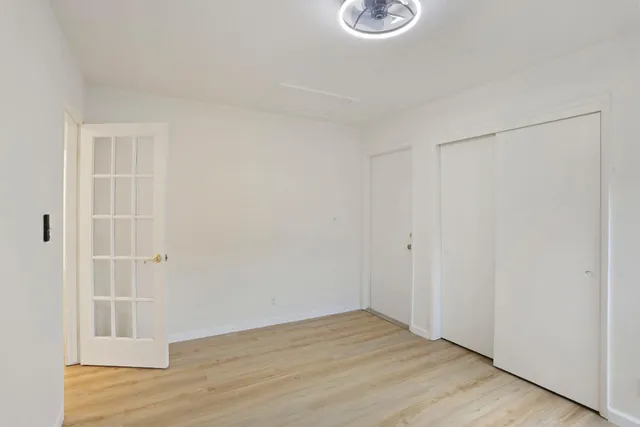 a bathroom with a sink a vanity and a mirror