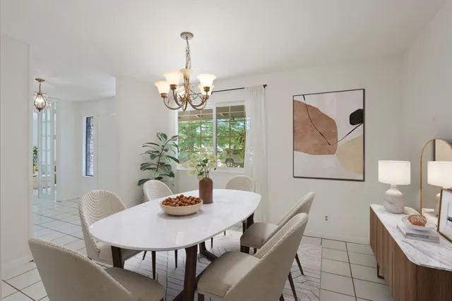 a living room with fireplace furniture and a flat screen tv