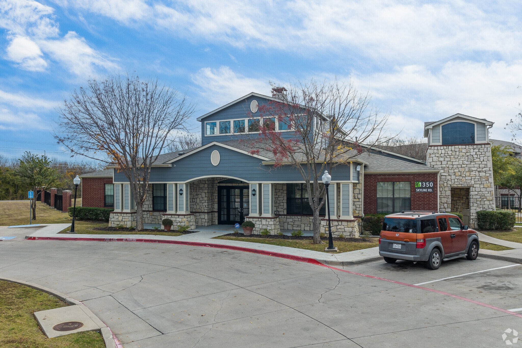 1350 Skyline Road Grand Prairie, TX 75051 - Photo 2 of 10 a car parked in front of building