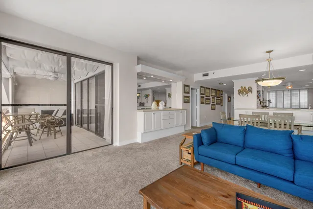 a view of a hallway with wooden shelves