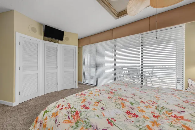 a bathroom with a shower sink and mirror