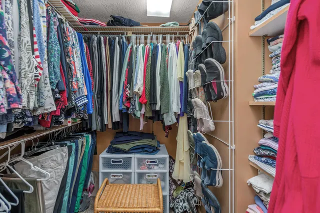 a bathroom with a toilet sink and shower