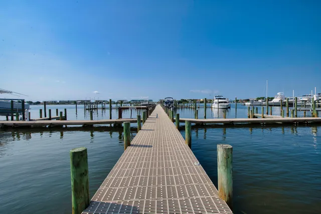 a view of a terrace with wooden floor and lake view