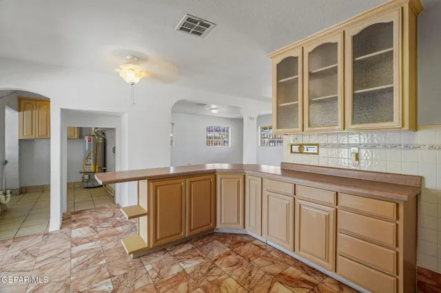 a view of a swimming pool with an outdoor space and seating area