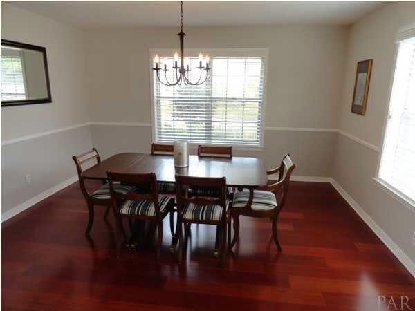 4055 Tronjo Road Pensacola, FL 32503 - Photo 7 of 20 Formal Dining Room with Brazilian Cherry Floors