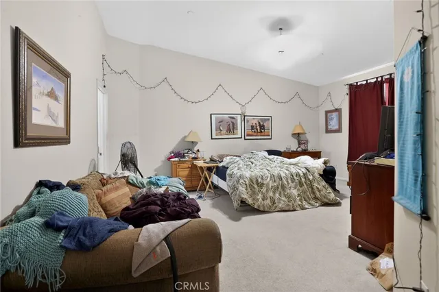 a room with musical instrument pool table and windows