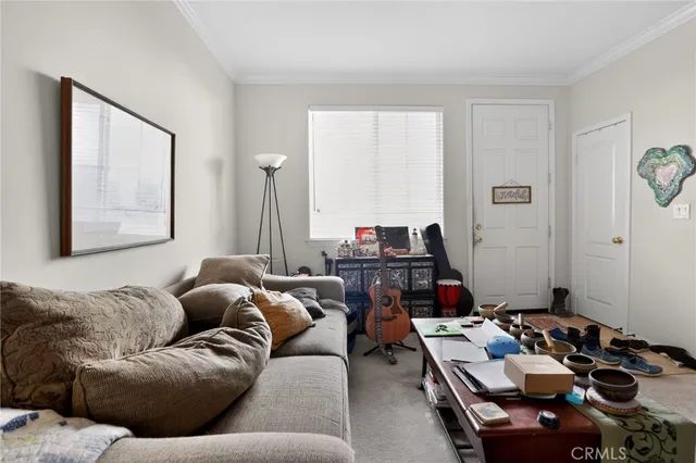 a view of a livingroom with furniture and a couch