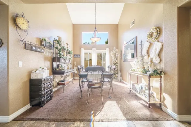 a view of a dining room with furniture