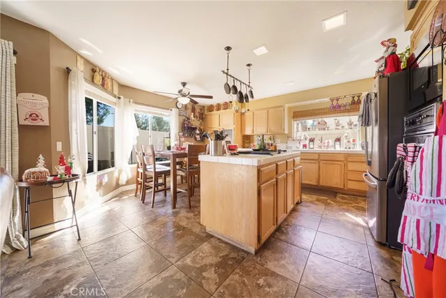 a kitchen with sink cabinets and window