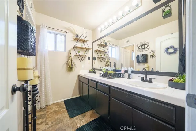 a bathroom with a toilet and a sink