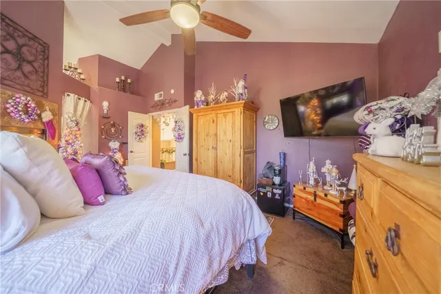 a spacious bathroom with a granite countertop sink mirror and bathtub